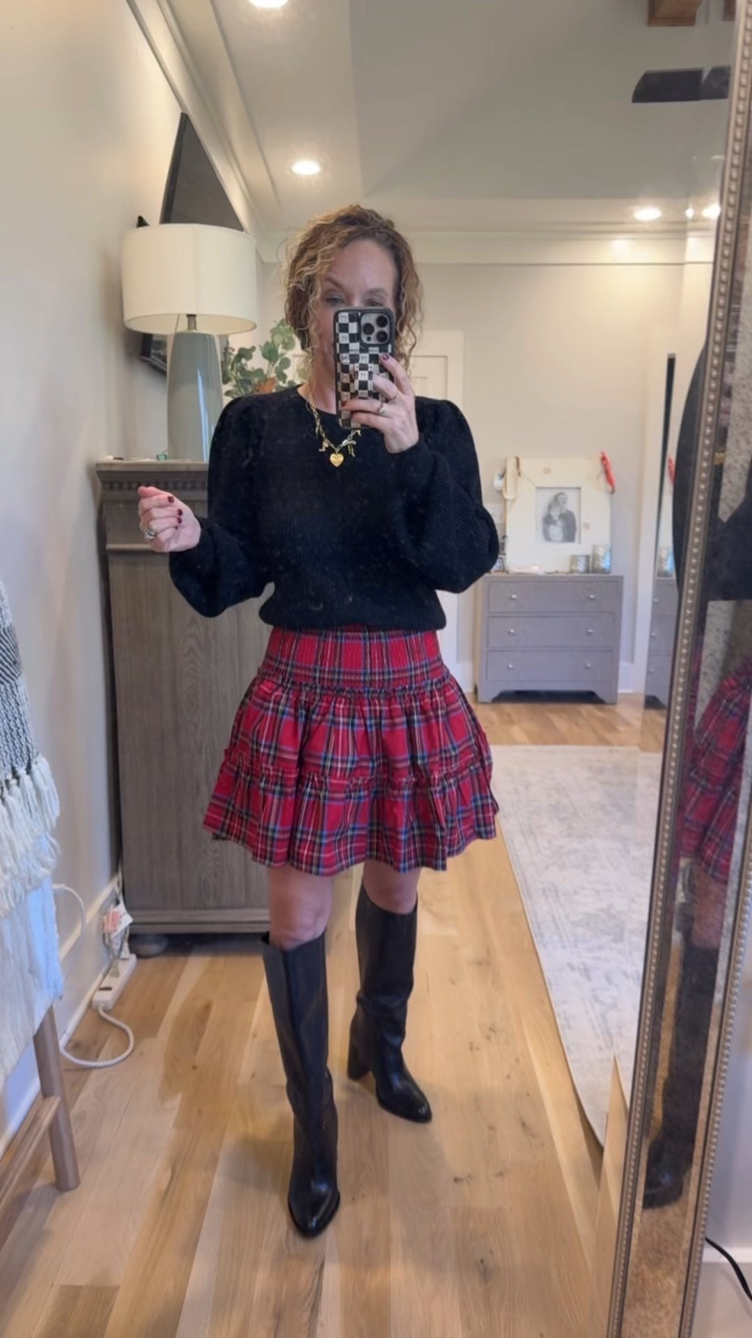 The cutest plaid holiday skort!  Paired with black sweater and black knee high boots!

I'm in the XS and I'm 5'1"

The elastic waist makes this so comfy and easily adjustable if you need it longer!!

#LTKSeasonal #LTKHoliday #LTKPetite