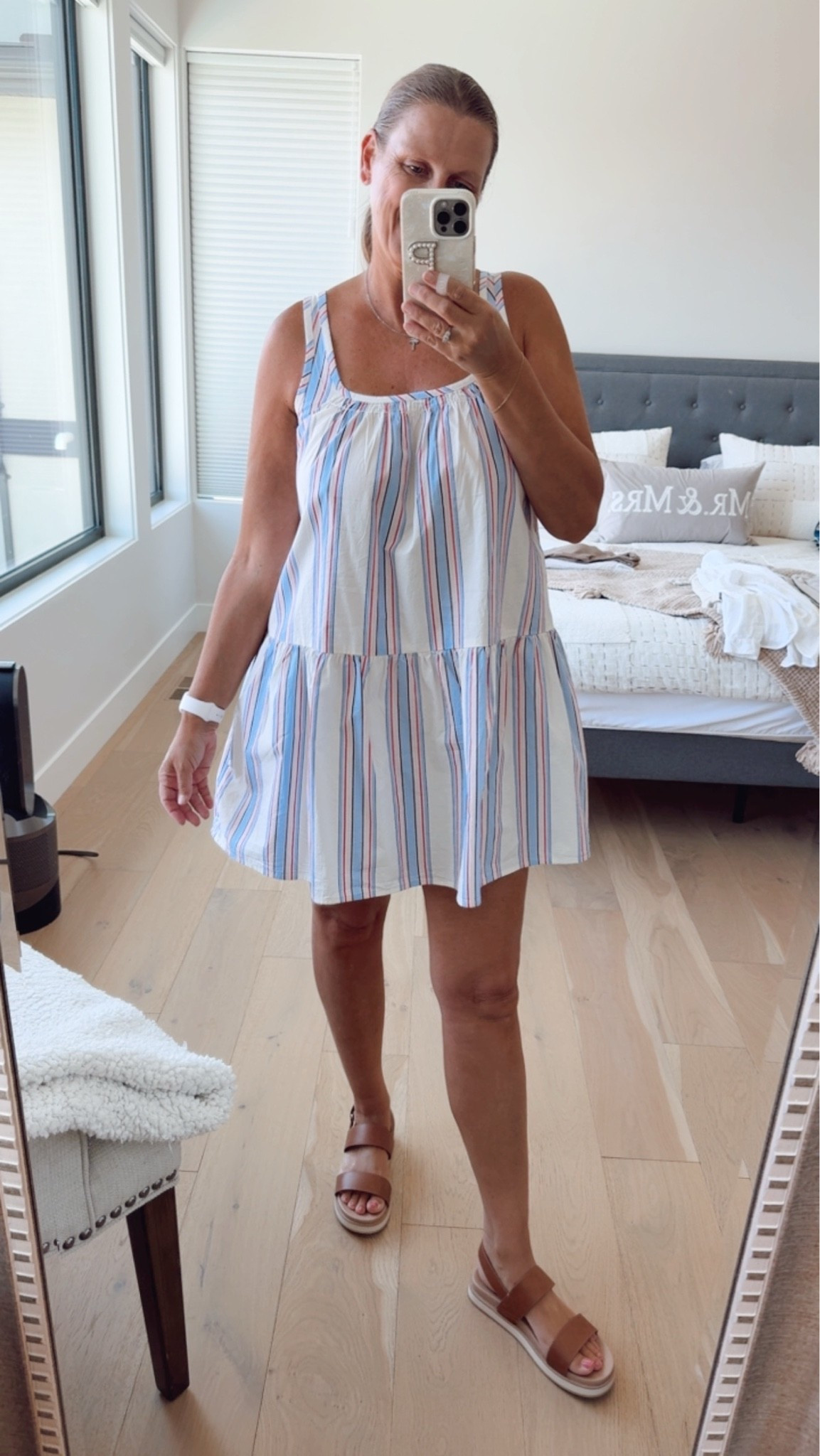 Striped summer dress season 🩵 
This tiered mini is giving effortless warm-weather style — perfect with sandals for a beach day or dressed up with wedges for dinner out.

Fits oversized do size down in this, wearing the regular length and I’m 5’8”

#LTKsummer #LTKdresses #LTKstyletip