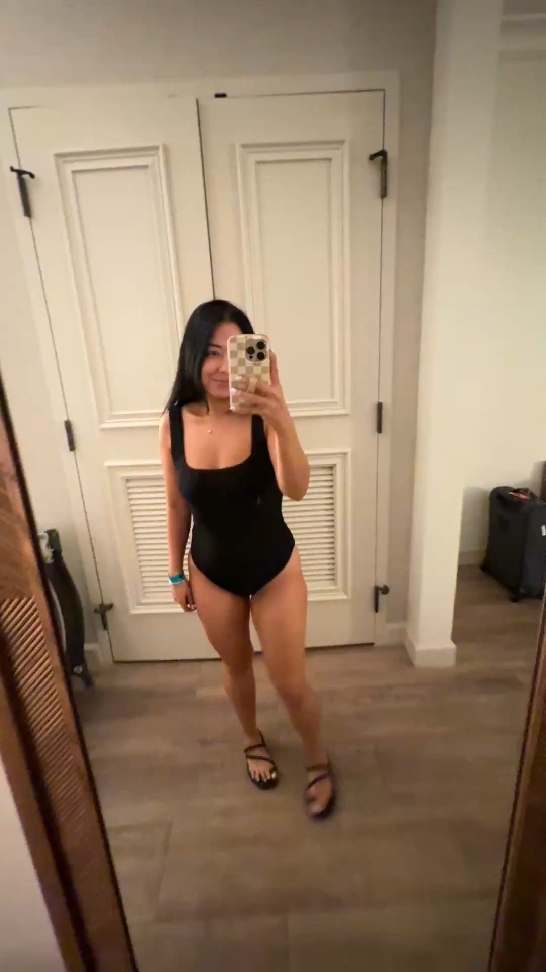 One piece black swimsuit from shoe me your mumu. 
This swimsuit is a must for any vacation or beach trip. 
Size medium (I always size up to medium in most swimsuits). 
Similar to Hunza g and soooo comfortable and flattering. Scrunch fabric. 
The perfect mom swimsuit that looks sexy but also very appropriate around kids and family. 
I’ve had this swimsuit for years and has held up so well. 
Will link the matching swim skirt coverup as well. 
Wearing crocs sandals. TTS  

#LTKmomlife #LTKPetite #LTKSwim