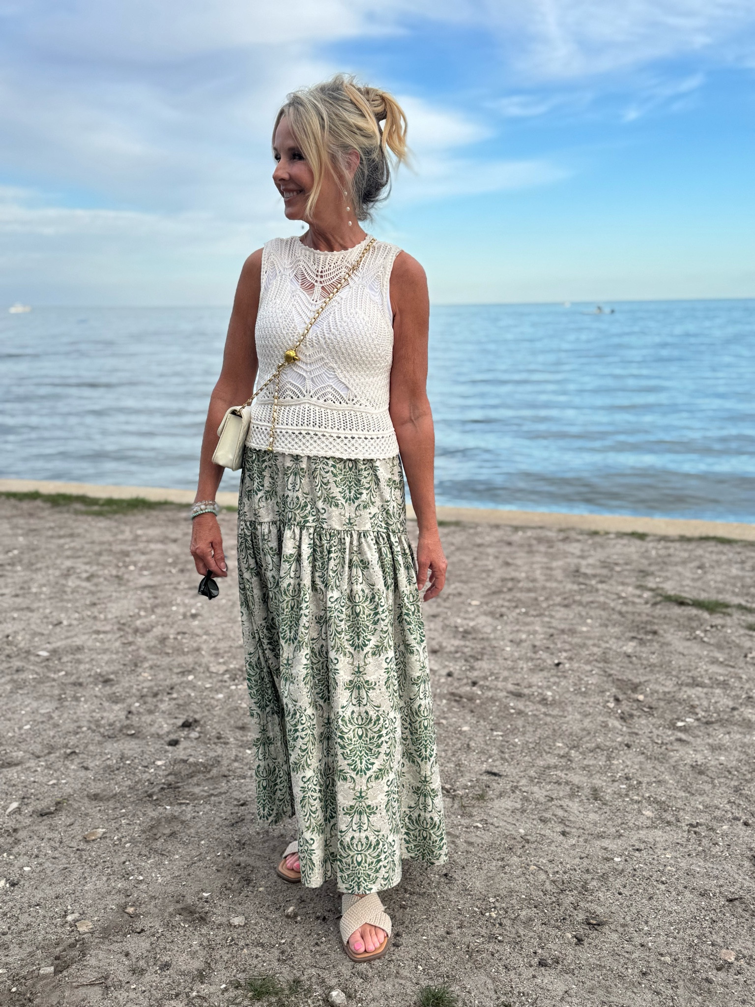 February’s in Florida will always be special. Wearing a macrame woven top by abercrombie & fitch with this pretty green + ivory floral maxi from Shein. Ivory + gold chained quilted stitch crossbody purse is from Amazon. Sandals are @pinklily. #beachoutfit #vacationoutfit #fashionover50 #summeroutfit 

#LTKTravel #LTKFindsUnder50 #LTKOver40