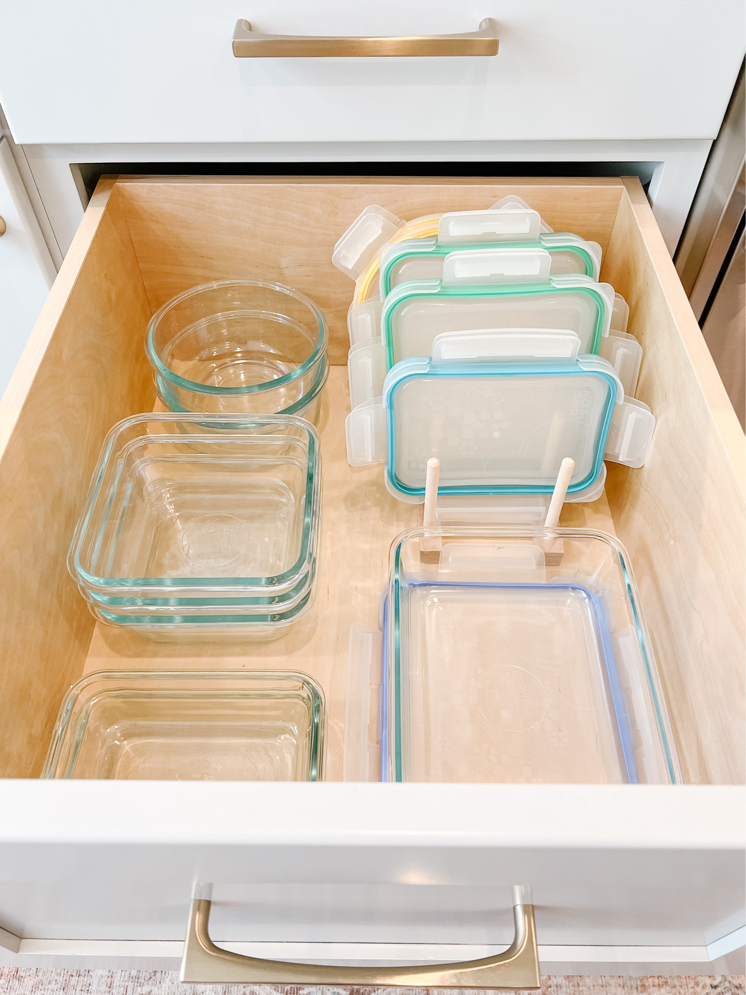Storing Tupperware with this little wooden organizer is a breeze.

Kitchen organization
Food storage 

#LTKGiftGuide #LTKfindsunder50 #LTKhome