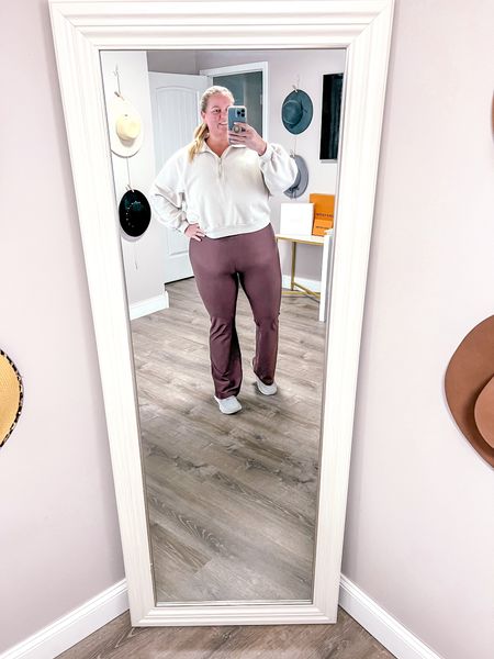 Plus size athleisure flare pants and quarter zip pullover sweatshirt 

I’m wearing the XXL in both pants and pullover sweatshirt. 

#LTKplussize #LTKfitness #LTKSeasonal