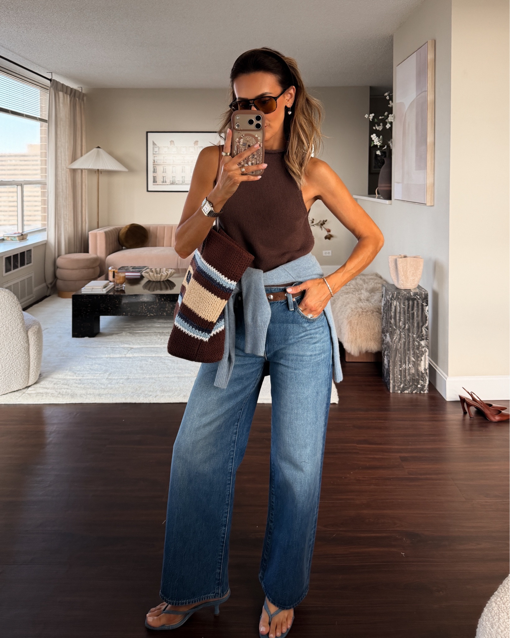 For a more casual/ end of summer look I’d wear a sleeveless mock neck sweater and cashmere polo around the waist and thong sandals with my crochet bag!

#LTKgrwm #LTKootd #LTKSeasonal