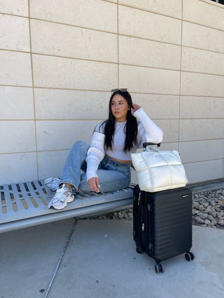 Airport outfit idea 
Skims tee: small
American Eagle jeans: 4 short 
New balance 9060 sneakers: 4.5 men 
Puffer tote 
Aviator sunglasses 
Hard shell carry on roller suitcase 

#LTKstyletip #LTKtravel #LTKSeasonal