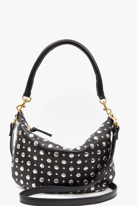 It’s like a sophisticated punk rock handbag. This embellished shoulder bag is great for a concert paired with your holiday outfit.  All I know is I want it!
#FullHandbags #fallbags #holiday #GiftsForHer #EmbellishedBag #ShoulderBag 

#LTKitbag #LTKSeasonal #LTKHoliday
