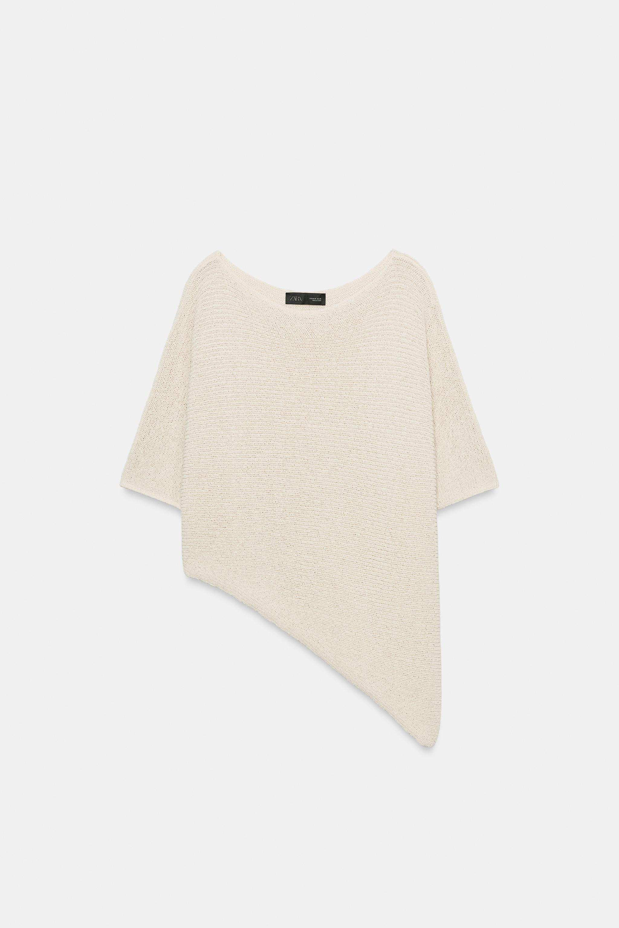 DescriptionContentsMeasurementsRound neck, short sleeve top. Asymmetric hem.Sand2756/032/711 | Zara US
