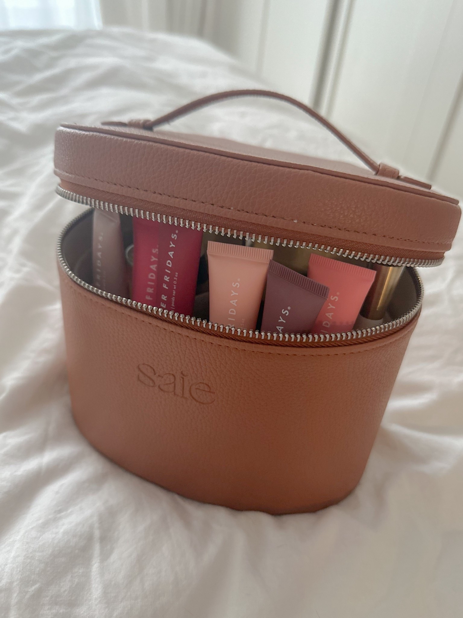 Finally got my hands on this cute Saie vanity case 🤎🤩 Already filled it to the brim with my Summer Fridays lip butter balms 🩷

#LTKItBag #LTKBeauty #LTKTravel