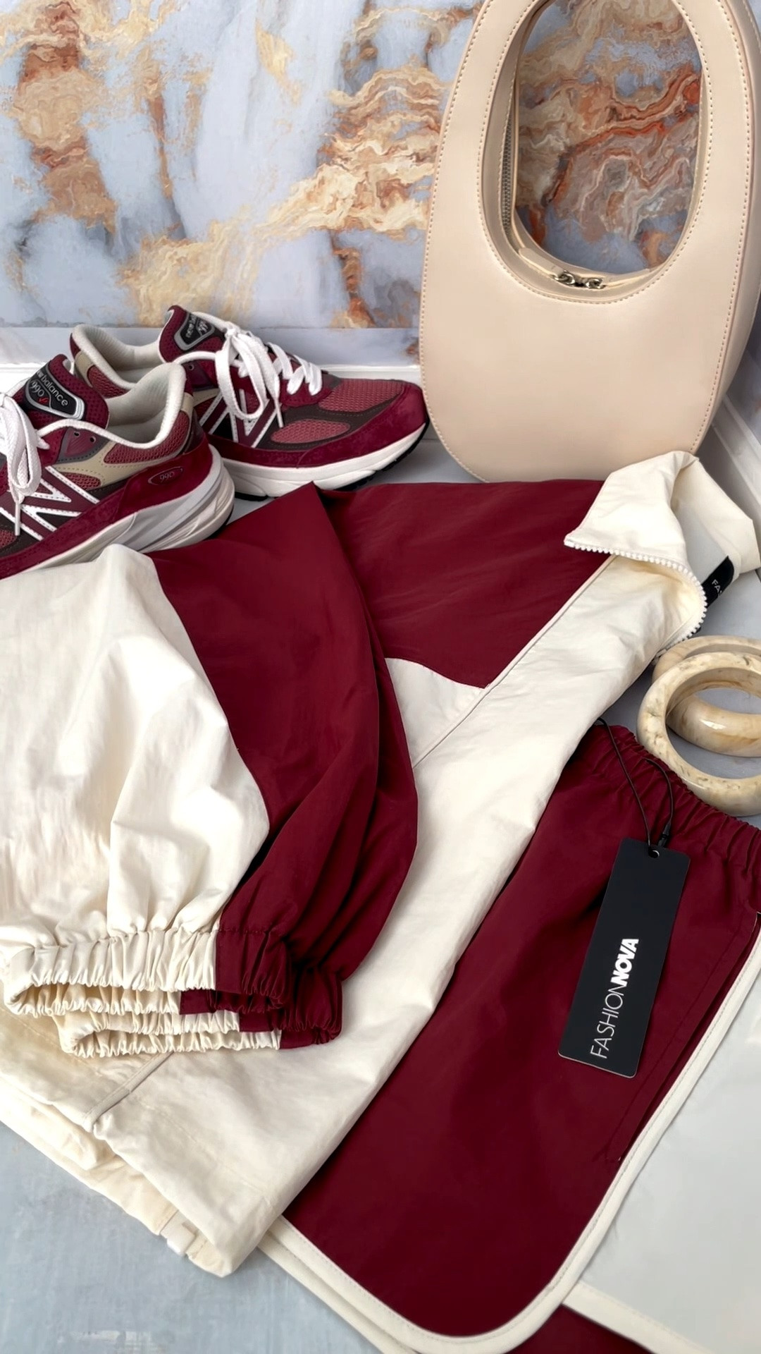 DISCLAIMER: Please search for the items on Fashion Nova website directly.  
🔍 Extra Mile Color Block Windbreaker Short - Burgundy
🔍 Extra Mile Color Block Windbreaker Jacket - Burgundy

Size Reference I got a small Jacket and medium shorts. 
Purse is sold out. It’s an oldie but goodie

#LTKdayinmylife #LTKgrwm #LTKootd
