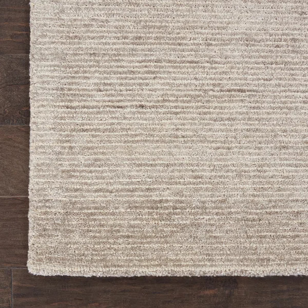 Zendejas Solid Oatmeal Beige Area Rug | Wayfair North America
