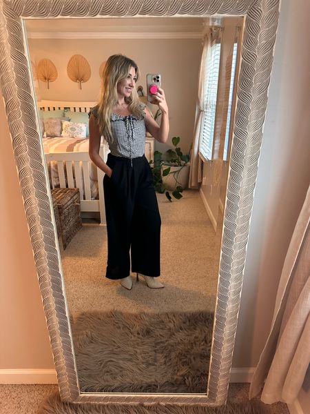 OOTD 🖤🤍

Fashion forward work outfit with a fun feminine twist . 

Black Plaid Boat Self-Tie Halter Gathered Bodysuit with wide leg black pants. My boots are linked too.

#LTKfindsunder50 #LTKworkwear #LTKtravel