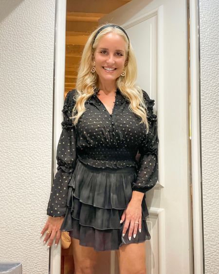 I loved this black and gold Swiss dot top for Paris! I paired it with a cute black ruffled skirt and ballet flats. Perfect for walking to dinner that night. Both my top and skirt are 30% off right now! 

#LTKsalealert #LTKstyletip #LTKfindsunder50