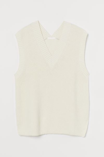 Loose-fit, knit sweater vest in a soft cotton blend. V-neck, gently dropped shoulders with back-f... | H&M (US)