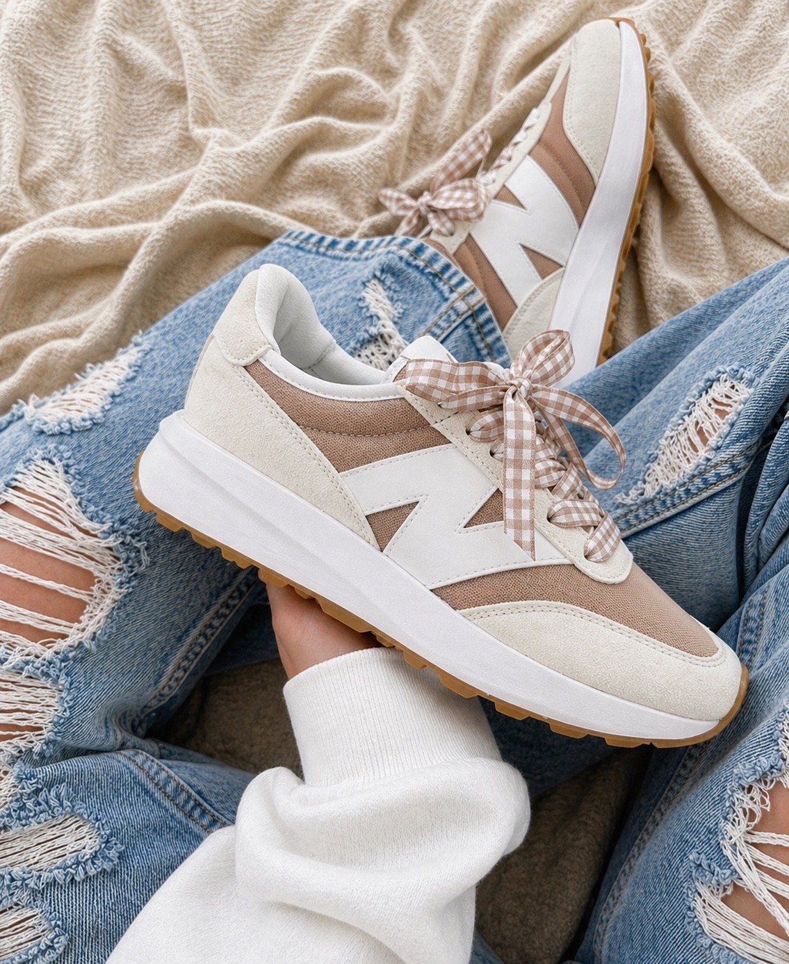 OK HOLD UP 🚨 THIS IS YOUR SIGN

New Balance you just don’t miss lately 😍

These cream + mocha summer sneakers??
STOP. They are EVERYTHING.

✨ soft neutral vibes
✨ little mesh = breathable for summer ☀️
✨ goes with literally your WHOLE closet

But you already know we’re not keeping them basic 👇
💥 swap in gingham laces
💥 add that bow
💥 instant CUTENESS OVERLOAD

This is that shoe you grab:
✔️ ball field
✔️ errands
✔️ vacation
✔️ everyday mom life

AND THEN… are you ready for this?! 👀
👉 $39.98 👏👏👏

Like excuse me?! That’s a buy now, don’t think, don’t wait price.

Sizes will NOT last at this price — I’m telling you right now 🏃‍♀️💨

#LTKgrwm #LTKootd #LTKdayinmylife