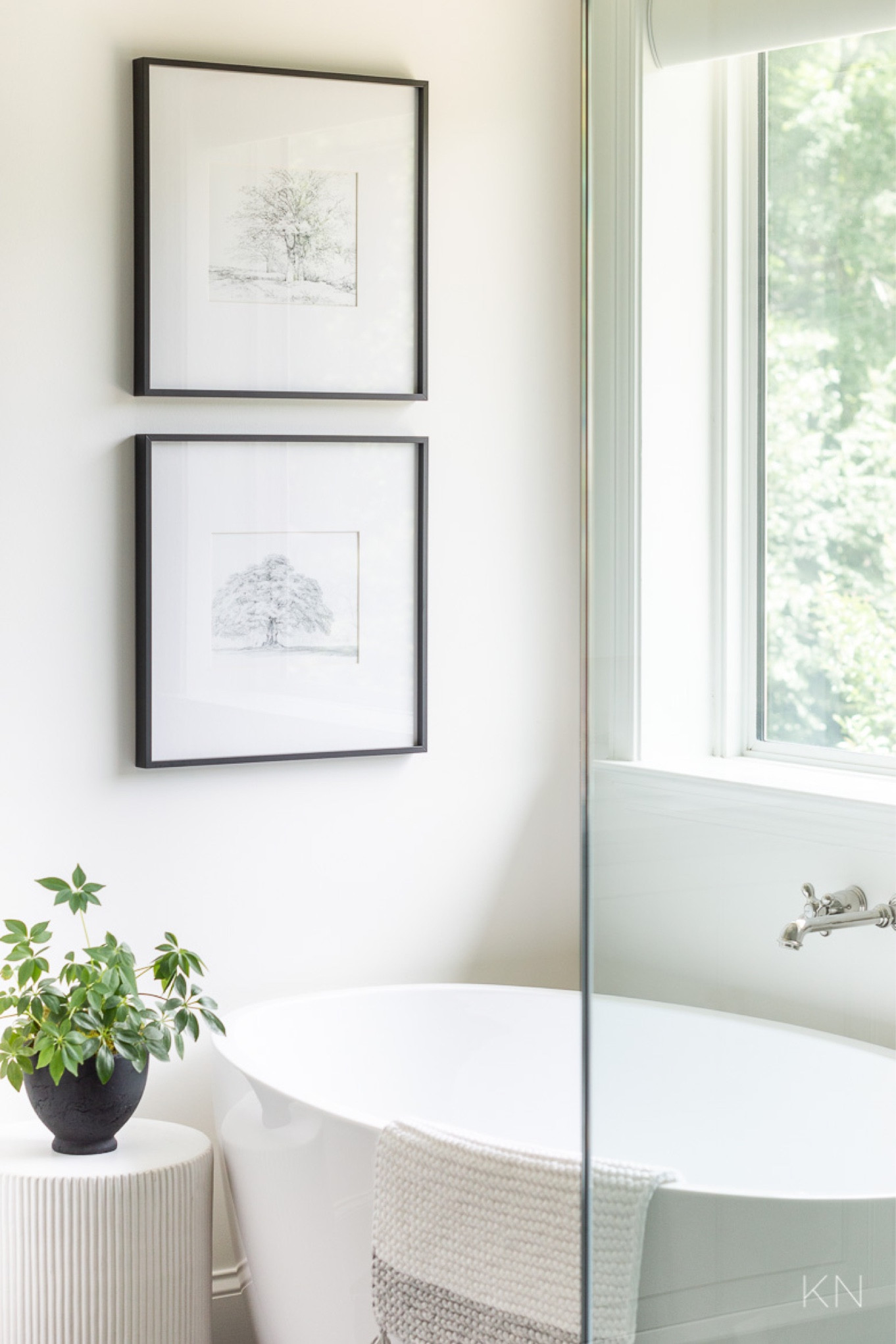 I love this simple and affordable art in our primary bathroom next to our freestanding tub. The fluted side table has also been key and its surface is large enough to hold a plant, a candle and more. home decor bathroom decor tub filler gallery wall black and white print #LTKStyleTip 

#LTKFindsUnder50 #LTKHome