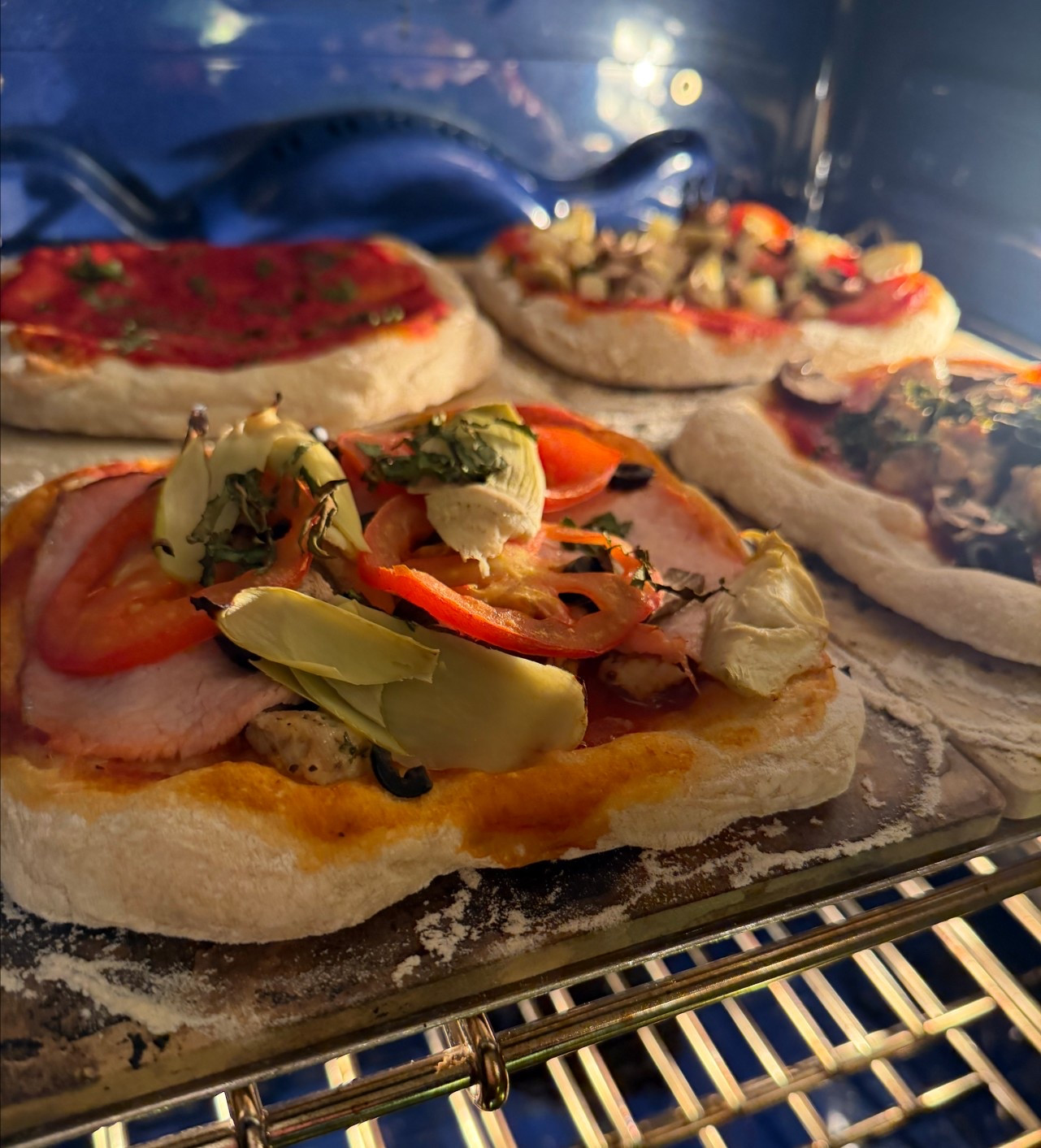 Homemade personal pizzas! Made in a conventional oven; no pizza oven needed! Perfect for an easy & fun family dinner. 🍕

@surlatable #surlatable 

#LTKfoodie #LTKGiftGuide #LTKHome