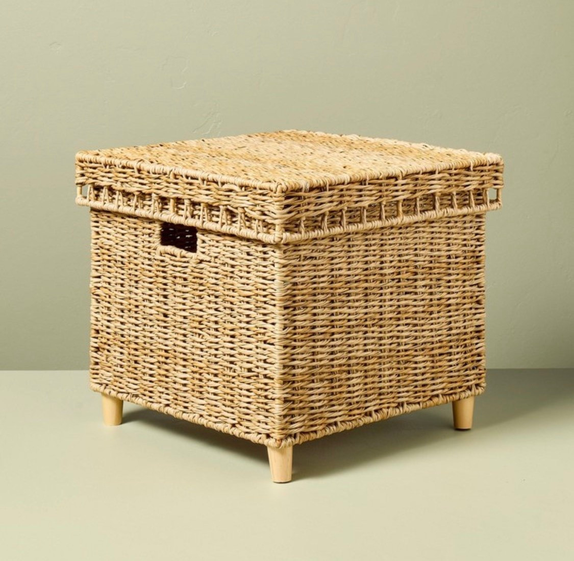 Organize your outdoor spaces with ease with this Woven Garden & Outdoor Patio Storage Box from Hearth & Hand™ with Magnolia. Supported on a metal frame, this square storage box is made from water-resistant material and woven in a rattan-like pattern for a rustic look. Featuring a removable lid, this patio storage box boasts cutout handles for easy portability. This 3328-cubic-inches box is ideal for storing towels, seat cushions, pool toys and more. @Target 

#LTKHome #LTKSeasonal
