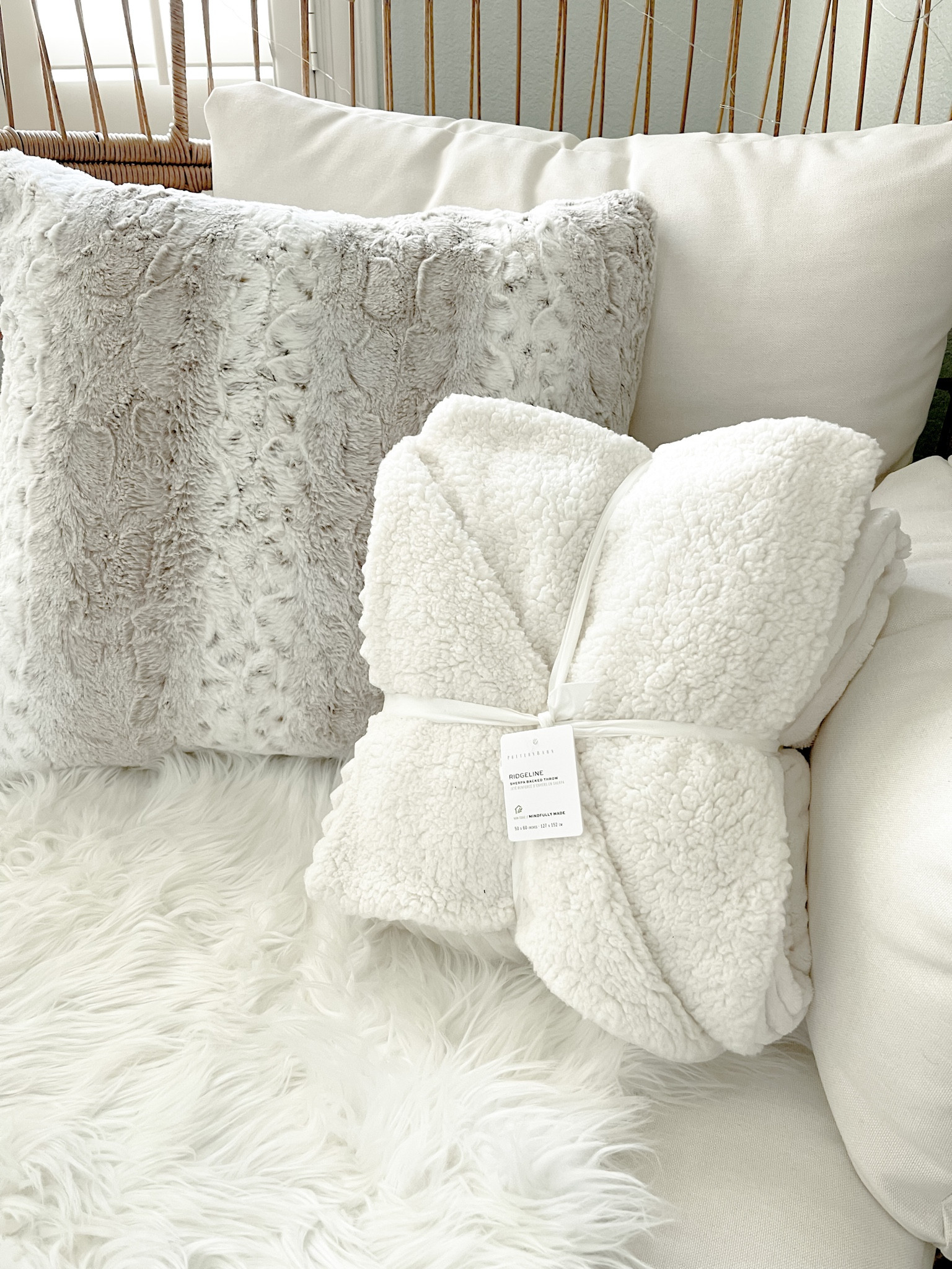 I am obsessed with this faux fur pillow and this ultra soft blanket every winter! 

www.livingbarelyblonde.com

#LTKSeasonal #LTKFind #LTKhome