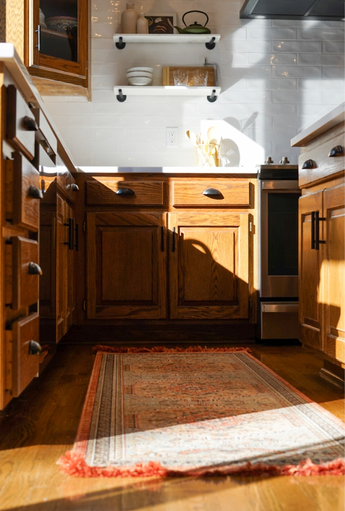 We love the colors and warmth this Target runner adds to our kitchen 💛