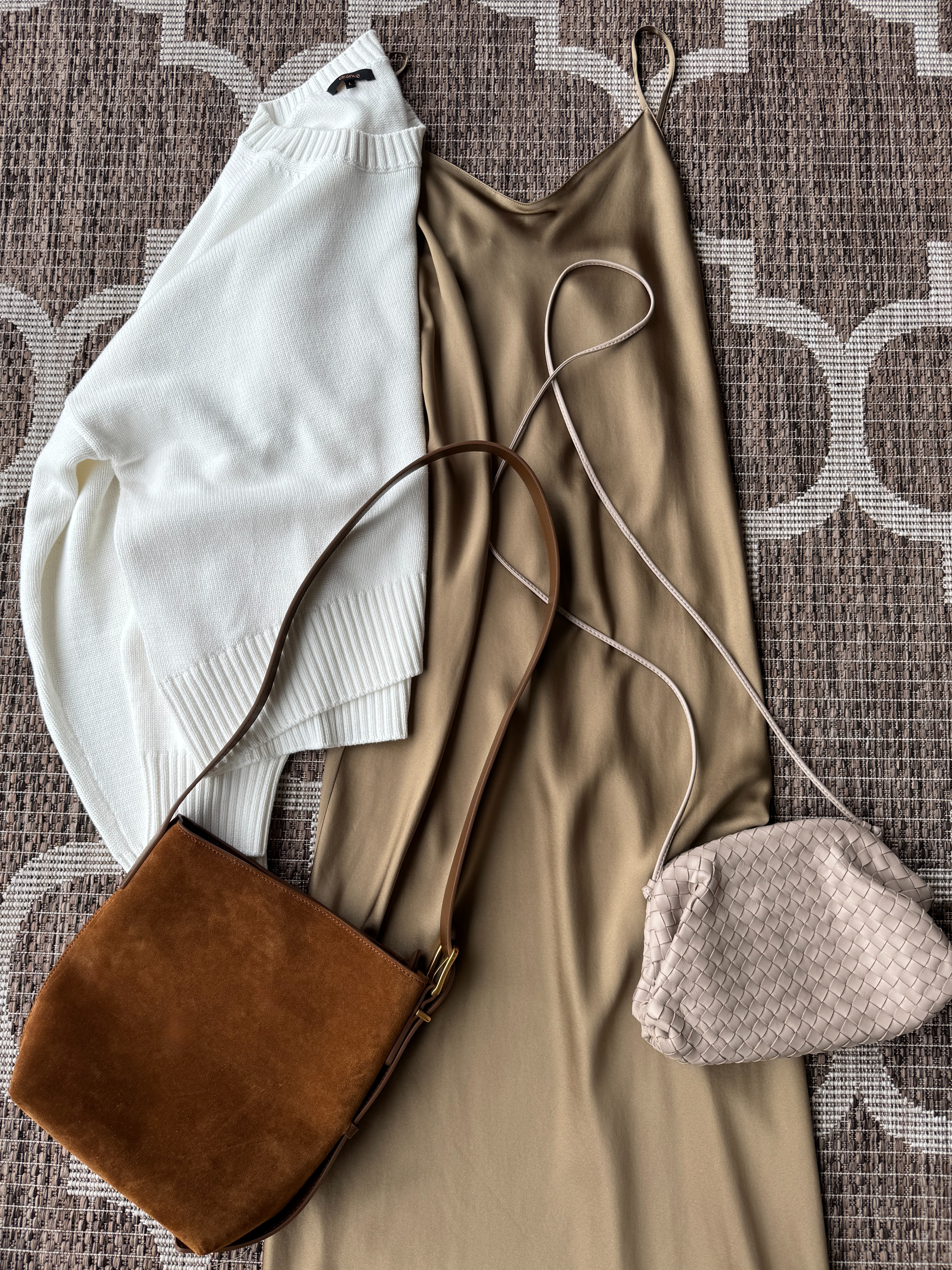 Ladies, help me choose which bag goes better with this ensemble - the brown suede or the taupe woven leather? 🤎💛


Just got new goodies from @Quince and, as always, I am taken aback by the quality and value you get for the money 😍


👗The Silk Maxi Dress is stunning - designed to show off your figure in a loose, flowy way. It fits true to size and can be worn in so many ways! 
👉The price of this dress is unbeatable - only $109!


🤍 The Ivory Organic Cotton Sweater is the perfect length to wear with this dress, or with anything, really! It’s the ideal weight for spring weather and cool summer evenings. I can see myself getting lots of wear out of this one, for just $39!

👜👝And the bags - couldn’t choose so ordered both of them 🙈 These styles are right on trend - minus the fancy price tags ;)
👉 The suede bucket bag was only $99 and the taupe crossbody clutch is similarly priced, which is incredible considering it’s hand woven out of Italian leather


Overall, this is my 3rd time ordering from Quince and I can see myself coming back for more :) The quality for the price is fantastic and all their pieces are stylish yet functional for everyday wear.

👉 Check out what I’ve ordered from Quince in the past + what else I’m eyeing right now below!




#quincepartner
@OneQuince 

 #LTKMidsize #LTKFindsUnder50 #LTKFindsUnder100