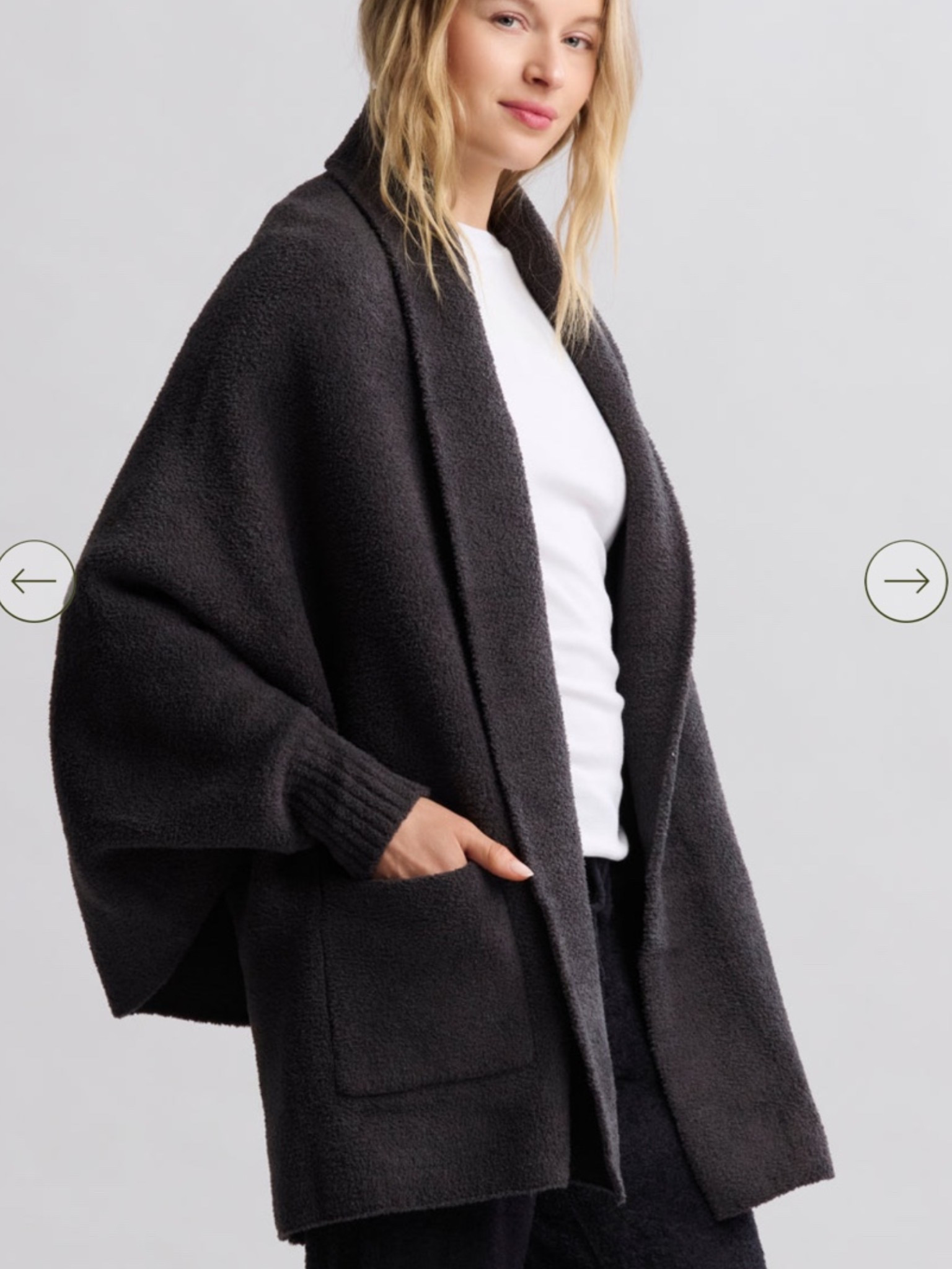 Barefoot dreams cocoon blanket cardigan. I wear a version from a couple years ago every morning. It’s SO cozy and worth every penny!