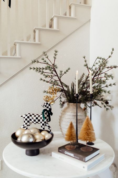 I’m loving the table set up in our living room! It’s perfect for the holiday season! 

Home decor, holiday home decor, seasonal finds, winter home, candle holder, home pots

#LTKhome #LTKHoliday #LTKSeasonal