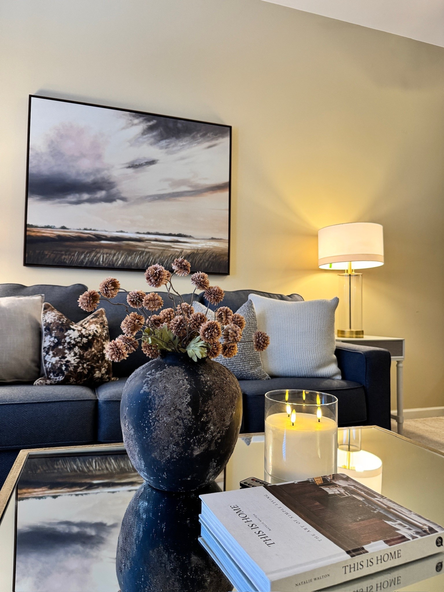 This is the combo we love and use constantly.

It makes a living room feel layered and inviting without changing the furniture. A strong patterned pillow, a warm candle, and one great coffee table book instantly finish the space. Everything linked.

#LTKOver40 #LTKSaleAlert #LTKHome