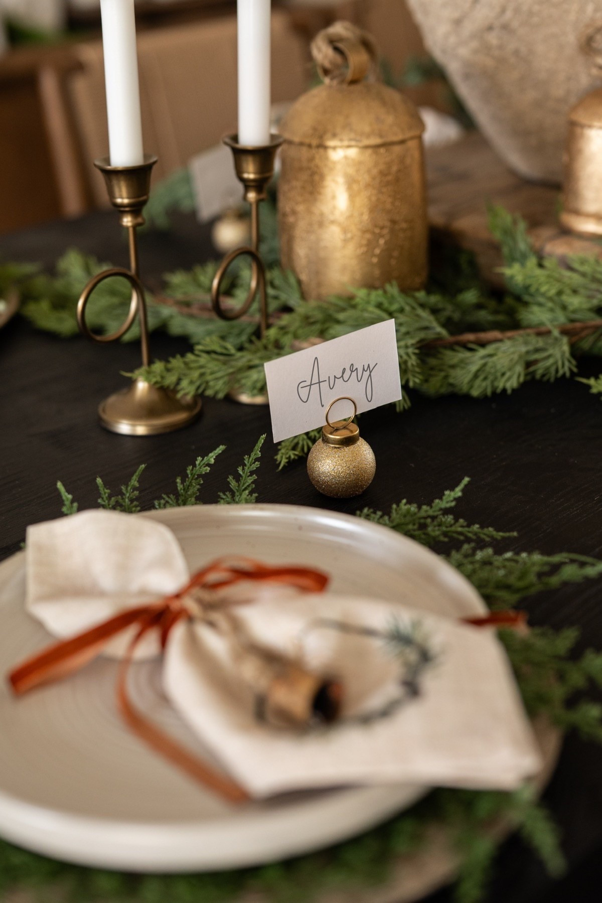 🎄 If you want a holiday table that feels elevated, warm, and incredibly thoughtful… this is your sign.
Between the personalized place cards, gold ornament holders, velvet ribbon napkin ties, brass bells, greenery chargers, and textured ceramic dinner plates, every detail works together to create a stunning Modern Classic Christmas moment.

#porcheandco #christmastablescape #holidaytabledecor #evergreenchargers #goldornamentplacecards #modernclassicstyle #cozyholidayhome #holidayenterainingdecor #brassbellstyling #tablescapeinspo

Do you want to bring our dreamy Modern Classic style interior design into your own home? 🏡 You’re in luck! Reserve our Online Interior Design packages today -> https://porcheandco.com/edesign ✨ We can’t wait to work with you & design your home with #porcheandco



#LTKSeasonal #LTKHome #LTKHoliday
