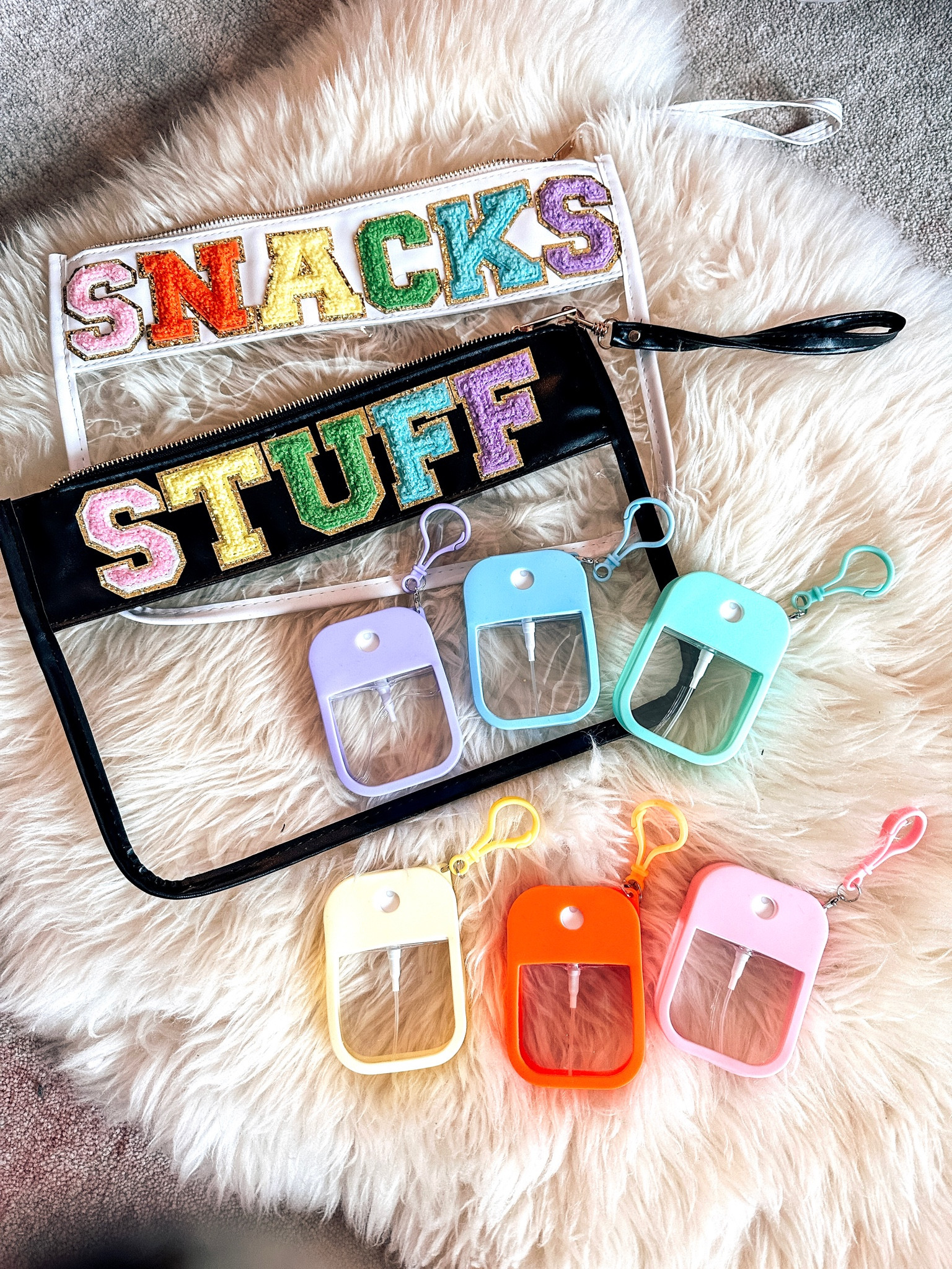 Chenille zipper pouch bag
Hand sanitizer sprays
Refillable hand sanitizer bottle 
Snacks pouch 

#LTKGiftGuide #LTKunder50 #LTKbeauty