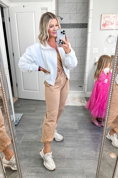 I found the best activewear jumpsuit and it comes in lengths 👏👏👏I’m wearing the small short. I love it paired with this white bomber jacket. This is the perfect Saturday style for all the activities and would be cute for travel

#LTKtravel #LTKfit #LTKsalealert