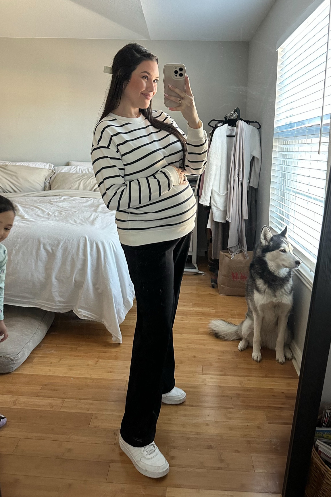 Bump friendly winter outfit at 28 weeks pregnant — wide leg trousers and an oversized sweatshirt with sneakers

#LTKStyleTip #LTKBump #LTKMidsize