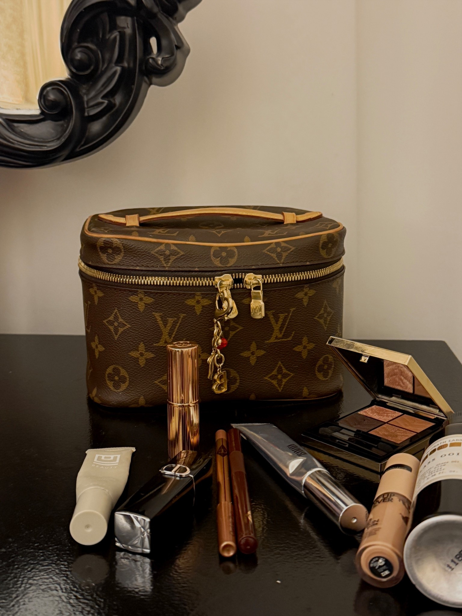 My current makeup go-tos for an easy, natural look that can be worn day to night PLUS my favorite shade of red lipstick (I get SO many compliments on it). 

#makeup
#makeupbag 

#LTKTravel #LTKgrwm #LTKBeauty