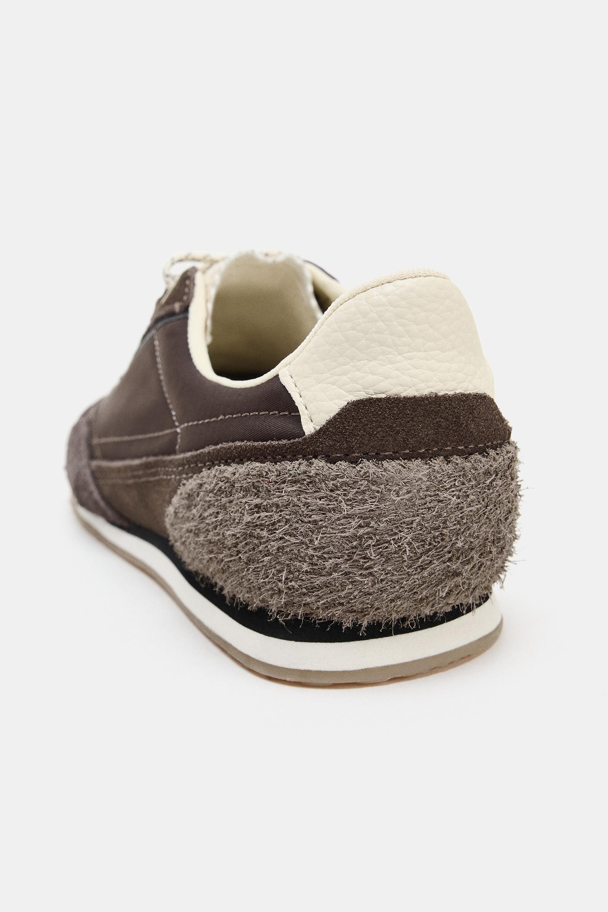 Sneakers in a mix of materials. Topstitching details on the upper. Contrasting heel detail. Lace-... | Zara US