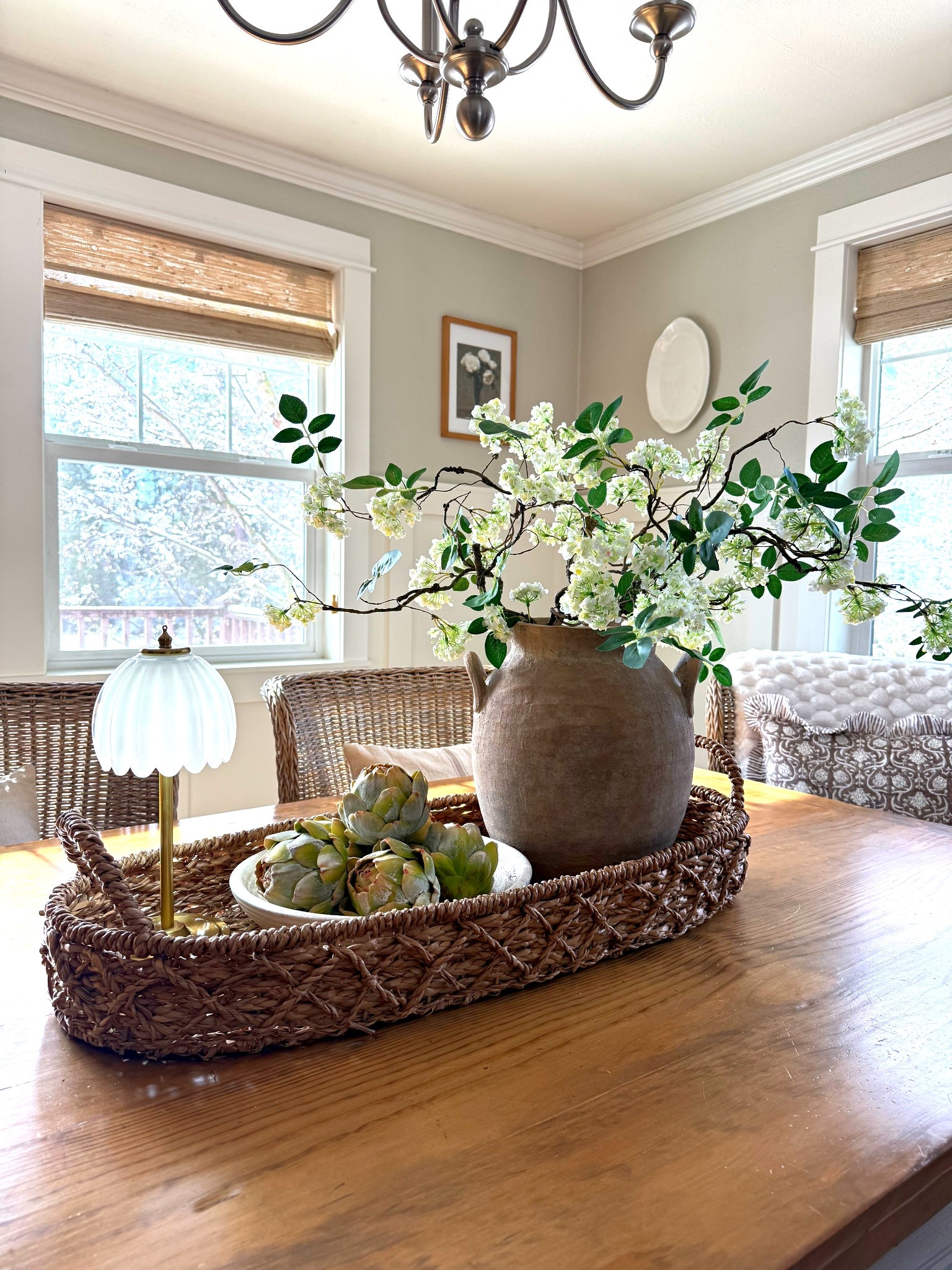 A cottage-core centerpiece that feels freshly gathered and quietly enchanting 🤍
An oval woven basket makes the perfect foundation for the center of the table—soft, organic, and easy to live with.
Layered inside, a loose bouquet of realistic spring stems arranged in organic mates, styled to look as though they were just clipped from the branches of a blooming bush. A rechargeable tulip lamp adds the gentlest glow, bringing warmth and charm to the table from morning through evening. Finished with a rustic, vintage-style bowl filled with realistic artichokes—a simple nod to early spring and the beauty of seasonal transition.
Collected, cozy, and naturally romantic—this is a centerpiece meant to stay, be used around, and enjoyed every day.


#LTKSeasonal #LTKHome
