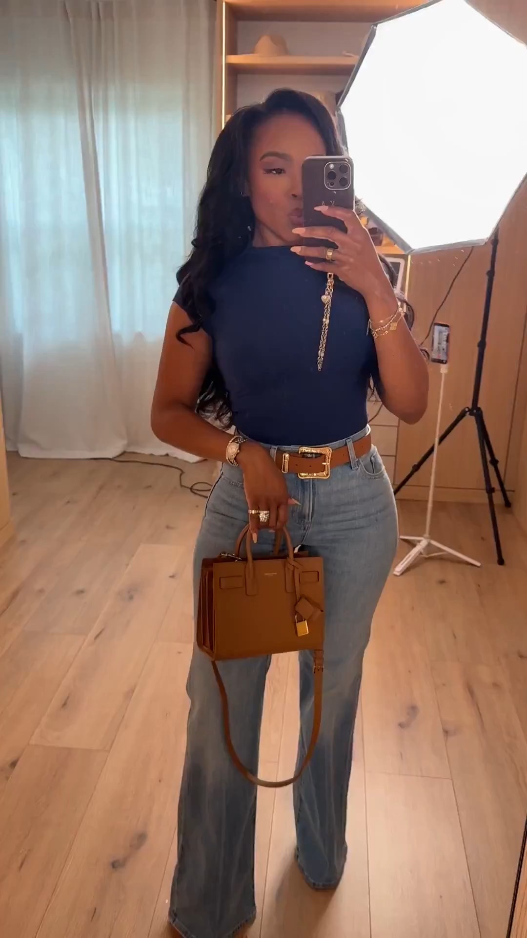 Scroll to shop 🤎  

A casual look with flare denim and a fitted navy top, giving chic, flattering, and the perfect every day look!￼￼

#LTKootd #LTKPetite #LTKdayinmylife