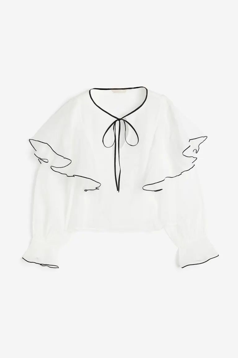 Flounce-trimmed blouse | H&M (UK, MY, IN, SG, PH, TW, HK)