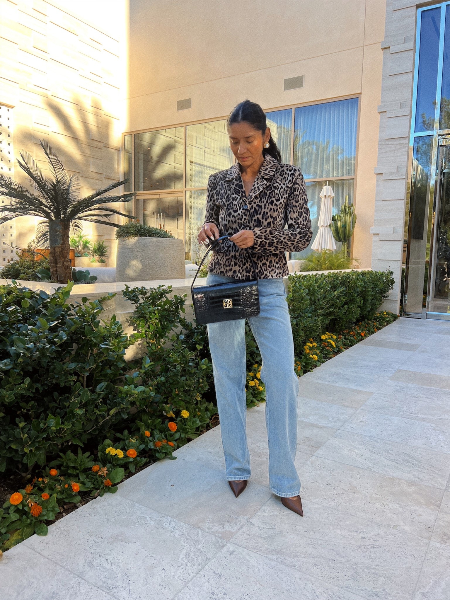 I’m into the leopard moment! The jacket runs a bit tight. I did a size small. Jeans are old. Shoes are money so comfortable tts. My favorite bag from Anine bling