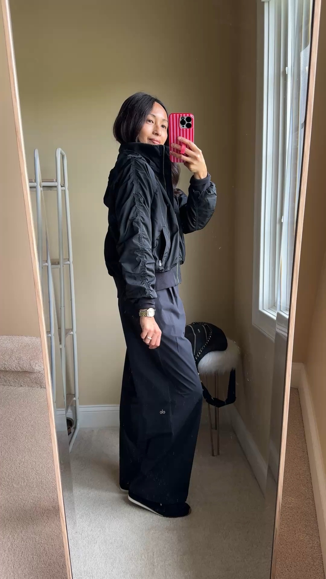 Most loved athleisure jacket. 
-I get requests for links multiple times a week on this jacket. Currently it’s 25 % off in black 40% off in white. And it’s one of my all-time favorites too. I have a light color from almost 3 years ago; this black one is 2 years old. 
Versatile style that works well as a travel jacket too. 
Chic lines and flattering fit. 
Stowaway hood. 
Soft material. 
Zip pockets. 
Side zips for extra comfort and style. 
True to size. 
- Pants are another athleisure favorite. I sizef down. Stylish trouser style fit. Wore these recently for travel and felt good in them. 
- Slim sneakers. 
-Sling bag. 


#LTKActive #LTKTravel #LTKOver40