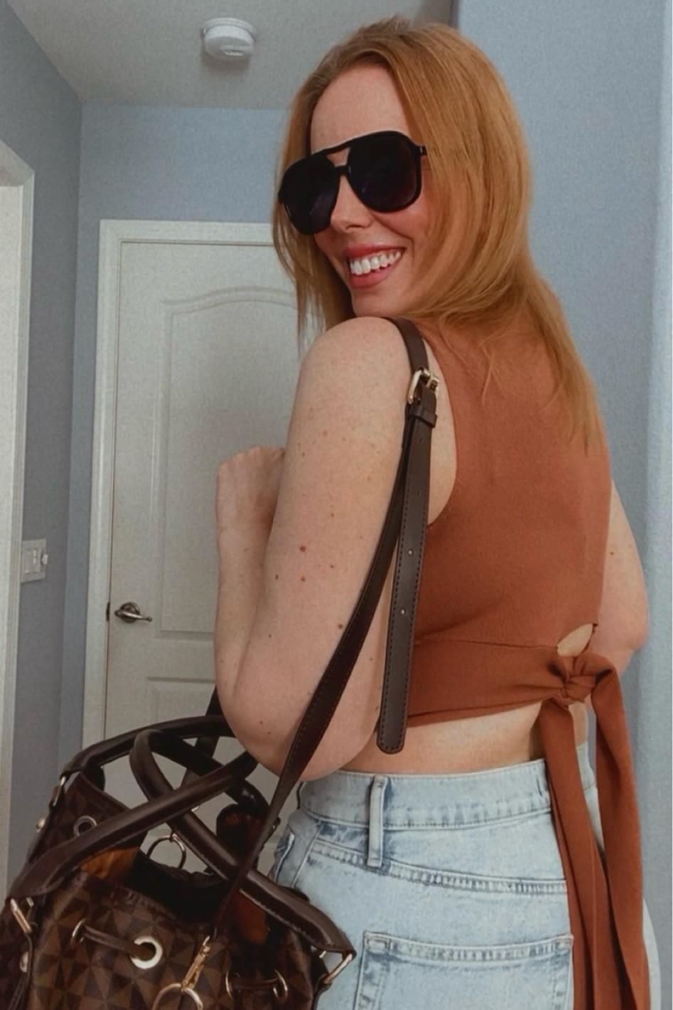 Styling this cute tie back tank from target! Material is soft and stretchy, has a sweater like feel, and fits TTS. Wearing a size small here, also comes in black and lavender  

#LTKstyletip #LTKover40 #LTKmidsize