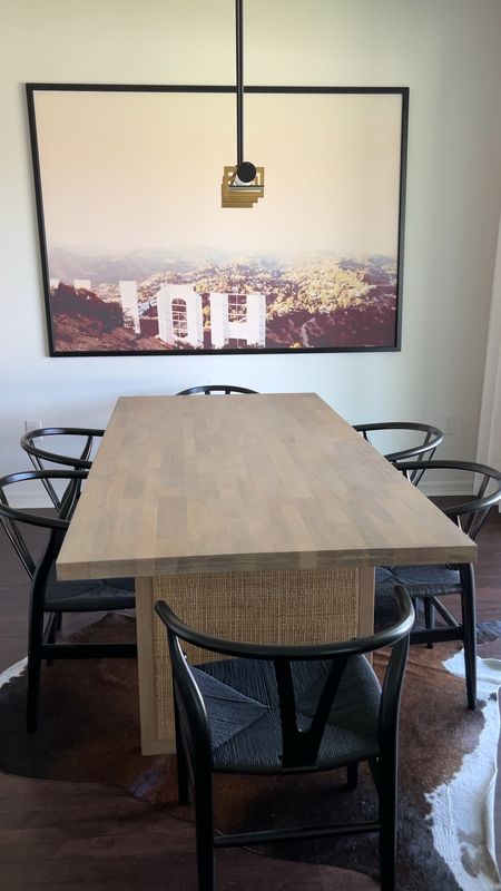 Organic Modern / California Casual Dining Room 

Wishbone dining chairs, black dining chairs, woven dining chairs, light wood dining table, 6 seat dining table, dining room, cowhide rug, modern coastal 

#LTKstyletip #LTKhome