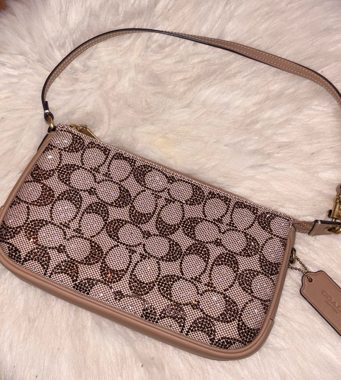 This Coach bag is stunning! I love all the sparkly crystals!

Coach / coach plaza / coach plaza bag / coach Crystal plaza bag / crystal coach bag / coach bag / coach handbag / designer handbag / designer bag / designer / coach shoulder bag / shoulder bag / sale / sale alert / handbags / bag / sale / sale alert / trendy / trendy bag / trendy handbag / trends / shopping trends / y2k bag / y2k aesthetic / y2k vibes

#LTKootd #LTKSeasonal #LTKgrwm