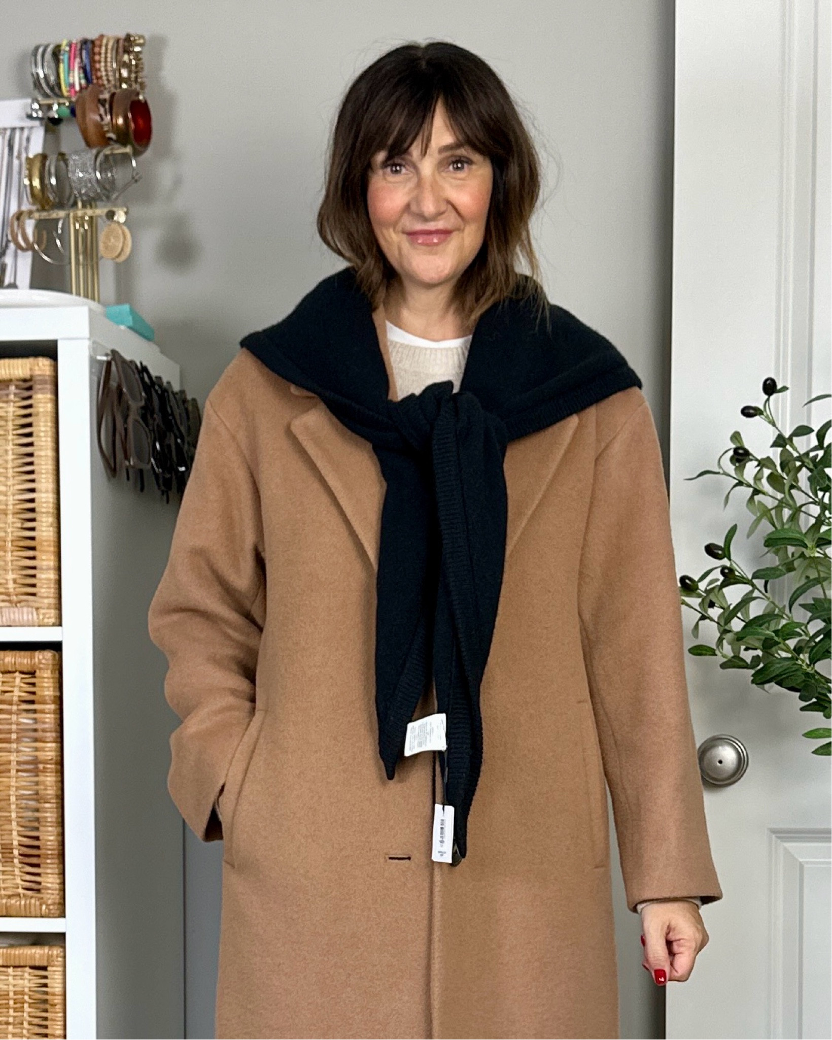 Gift worthy cashmere scarf that gives a similar vibe to a sweater over the shoulders! Super soft 100% cashmere, also comes in a few other colors and can be worn with the point at the front or draped on the side. 
Also linked a few other similar options 
My coat is my fave classic camel wool coat, great quality and not itchy! I’m wearing my usual size S


#LTKSeasonal #LTKStyleTip