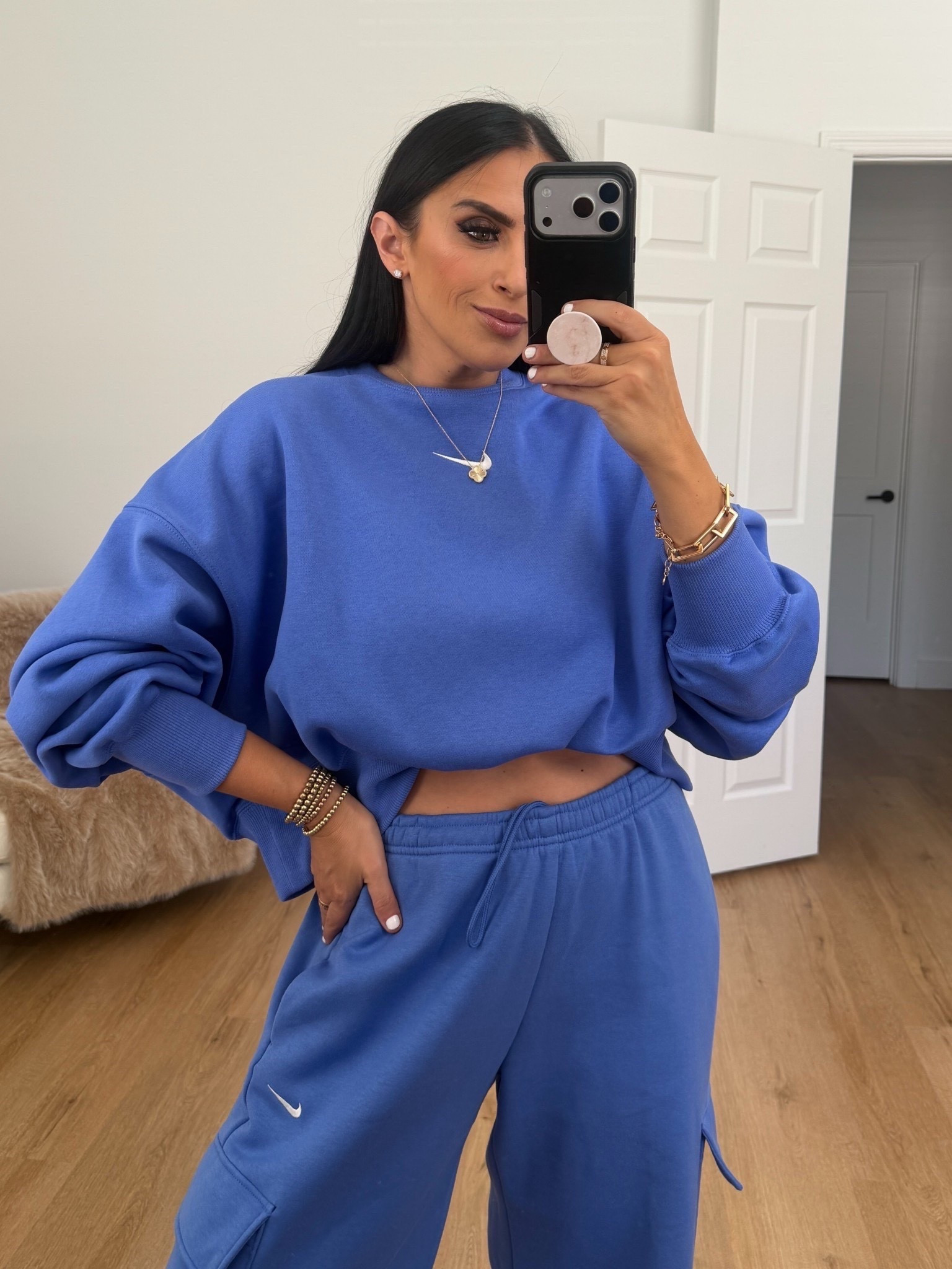 Nike Sportswear Phoenix Fleece Women's Cargo Sweatpants wearing size medium. Nike Sportswear Phoenix Fleece Women's Over-Oversized Crew-Neck Sweatshirt wearing size small. 
