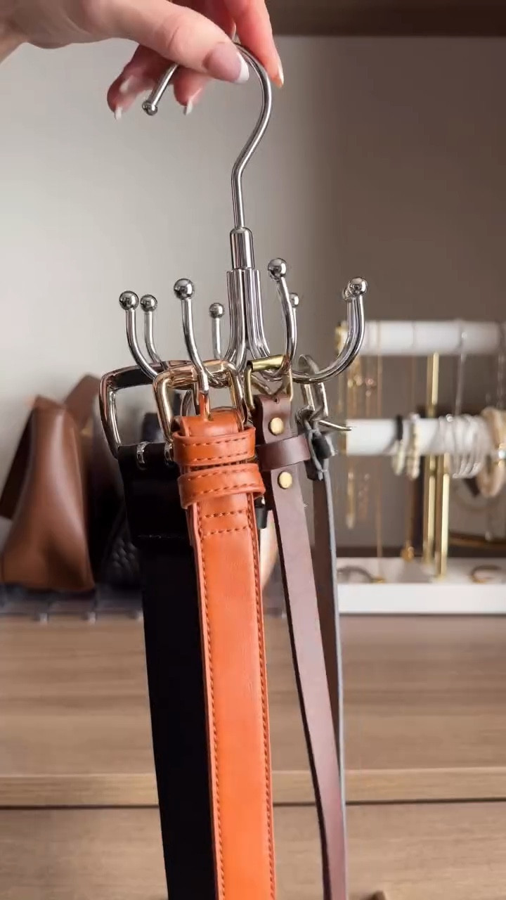 Under $7!! Amazon rotating belt hanger!! It easily organizes your belts for space-saving closet storage. 8 hooks hold up to 24 belts!! Honored to shop for our homes together!! 🥰♥️ Sooo grateful for YOU being here!! Have a beautiful day!! Xoxo, Andrea 🤟🏼 #amazonhome #amazonfashionfinds #amazonhomefinds #closetorganizer #closetorganization

#LTKHome