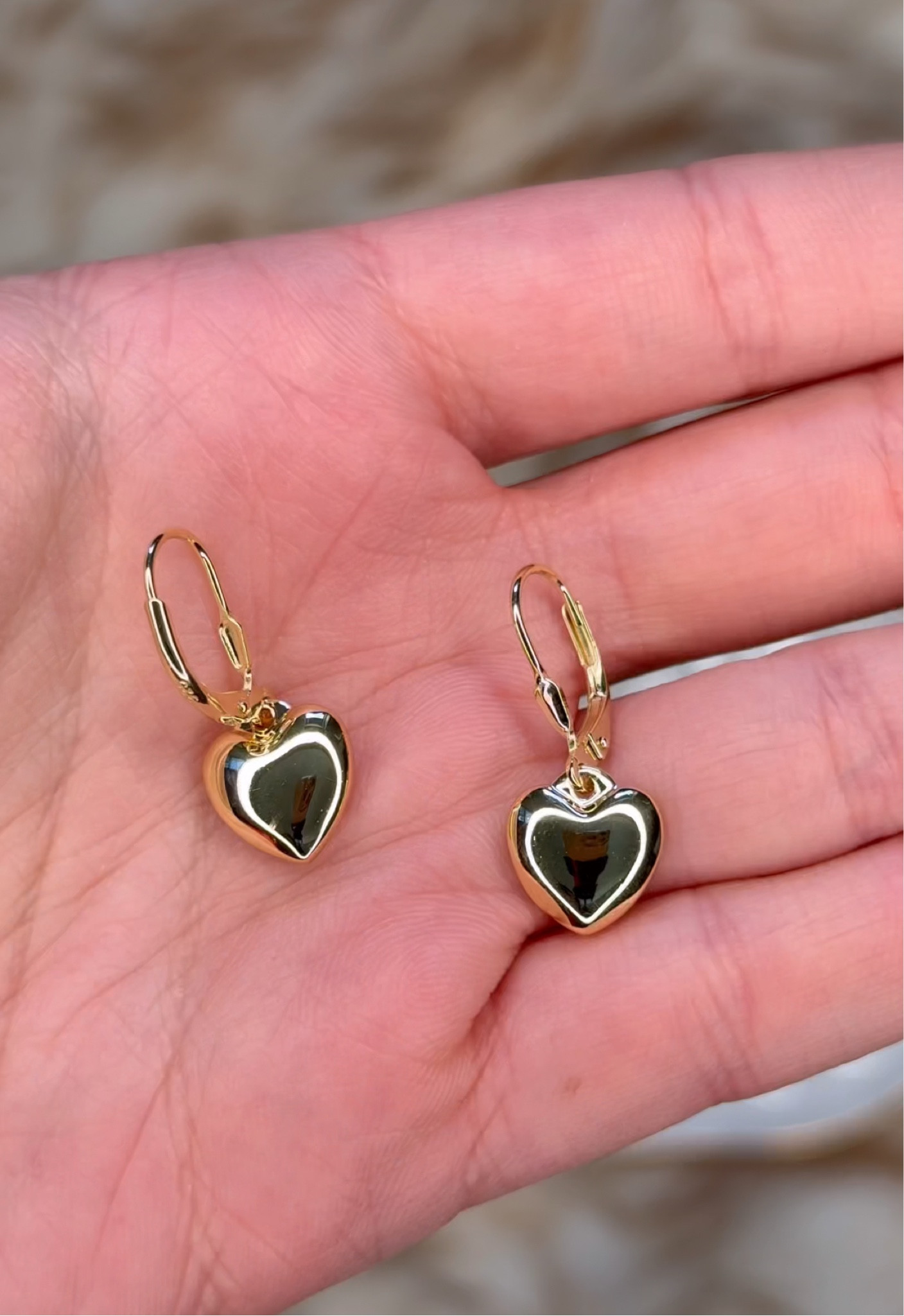 Sterling Silver Earrings: One pair of 14K Gold Plated 925 sterling silver heart dangle earrings. They are great for every day or dress up well, also these love heart dangle earrings are light-weight, cute and dainty, you can wear them with any outfit.
Quality Material: Made of sterling silver and 14K gold plated, secured with lever-back, this eye-catching heart dangle earrings are 100% handmade, hypoallergenic for sensitive ears, plated with real silver finish.

#LTKMostLoved #LTKFindsUnder50