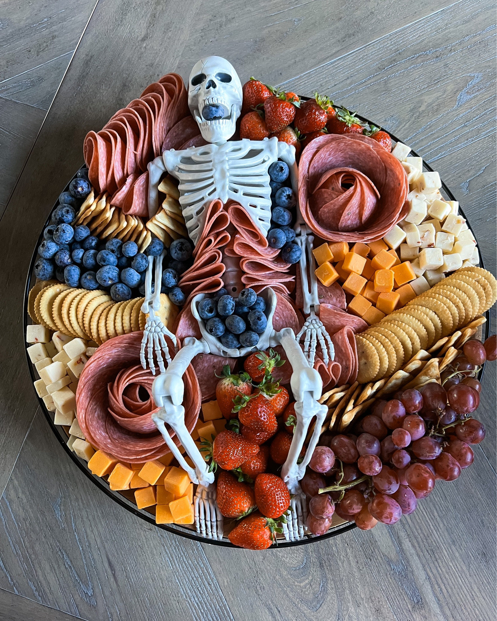 Halloween charcuterie board. Spooky charcuterie idea. Skeleton decor. Halloween decor. Halloween food. Halloween party ideas. Food ideas. Halloween snack board. Salami rose. Target home. Target finds. Skeleton charcuterie. 

#LTKSeasonal #LTKhome