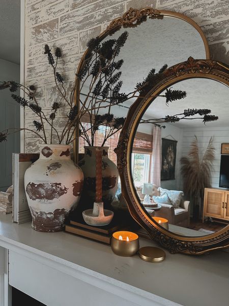Autumn fireplace mantle decor | mirror | candle | vase | floral | books | cottagecore