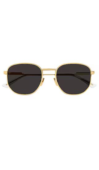 Light Ribbon Panthos Sunglasses in Shiny Gold & Solid Grey | Revolve Clothing (Global)