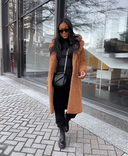 winter outfit inspiration 🧸🤎🫶🏾 love this long teddy coat paired with black joggers and combat boots! 

#LTKshoecrush #LTKstyletip #LTKSeasonal