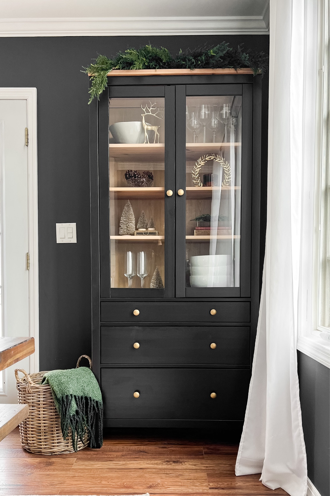 Christmas holiday decor in my dining room cabinet 

#LTKHoliday #LTKhome