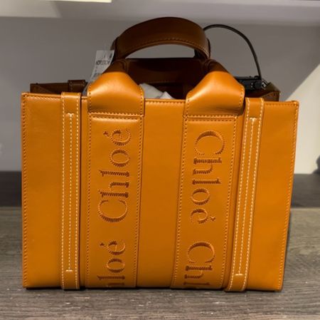 Seeing this Chloe bag in person was a game changer. It might be on the wish list. It is so cute. The leather is such high-quality and such a beautiful yellowy cognac color. It’s a good bag y’all. Small woody tote.

#LTKOver40 #LTKStyleTip #LTKItBag